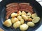 German Franconian bratwurst with roasted potatoes