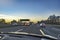 German highway in the evening with cars speeding without speed limit and limited view