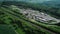 German highway, rest area and highspeed train railroad track - aerial view