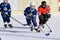 German kids playing ice hockey