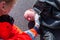 German paramedic check blood pressure on an injured biker