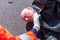 German paramedic check blood pressure on an injured biker