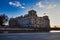 The German Parliament Building Reichstag on a spring evening`s sunset. View from the other bank of the Spree river