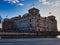 The German Parliament Building Reichstag on a spring evening`s sunset. View from the other bank of the Spree river