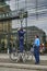 German Police or Polizei attaching no parking notice on a lamp pole near the US Embassy in Berlin, Germany