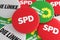 German Politics Concept: Pile of Buttons With The Logo of Parties SPD, The Greens, The Left, 3d illustration