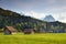 German rural scenery of timber barns in sunny meadow in spring