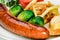 German sausage with potatoes and vegetables.