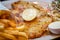 German schnitzel pork chop woth fries and apple coleslaw