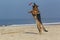 German Shepherd, Male catching frisbee, beach in Normandy