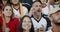 German soccer fans anxiously watching a game from stadium