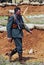 German soldier-reenactor walks on the battle field