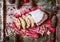 German Stollen Christmas Cake and Celebration Decorations. Traditional baking with Berries, Nuts, Marzipan.