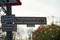 German Street Sign of Bergmannstrasse with additional Signs saying Roadway Damage and Sidewalk Damage