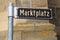 German street sign `Marktplatz` translates into market place