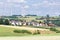 German village with houses, windmills and corn fields