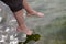 Germany, Baltic Sea, woman, feet in the water