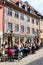 Germany Bavaria Romantic Road. The historical buildings of Fussen. People relaxing at an outdoor cafe