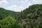 Germany, Burg Eltz Castle, a tree with a mountain in the background