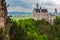 Germany - Castle with Paragliders Above - Neuschwanstein