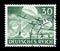 GERMANY - CIRCA 1943: German historical stamp: Paratroopers of the Wehrmacht  parachute in with transport aircraft Junkers Ju 52,