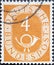 GERMANY - CIRCA 1951: a postage stamp from Germany, showing a sign Deutsche Bundespost with post horn   ocher