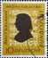 GERMANY - CIRCA 1956: This postage stamp in ocher yellow shows the portrait of the composer Robert Schumann against the background