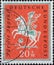 GERMANY - CIRCA 1958: a charity postage stamp printed in Germany showing an rider with hunting clothes and horn on a horse. Text: