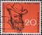 GERMANY - CIRCA 1958: This postage stamp shows the author Wilhelm Busch. The occasion is the 50th anniversary of Wilhelm Busch`s
