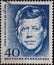 GERMANY - CIRCA 1964: a postage stamp printed in Germany showing an image of John F. Kenndey on the occasion of the first day of d