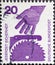 GERMANY - CIRCA 1971: a postage stamp from Germany, showing Motive for accident prevention. Text: Security at all times. Hand reac
