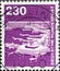 GERMANY - CIRCA 1978 : a postage stamp from Germany, showing a motif from industry and technology. Airport building with planes in
