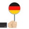 Germany circular flag. Hand holding round German flag. National symbol. Vector illustration.
