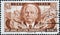 GERMANY, DDR - CIRCA 1954 : a postage stamp from Germany, GDR showing a portrait of Wilhelm Pieck, first President of the GDR; Fla