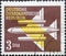 GERMANY, DDR - CIRCA 1957  : a postage stamp from Germany, GDR showing a stylized jet aircraft to the left top view without a co