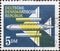 GERMANY, DDR - CIRCA 1957  : a postage stamp from Germany, GDR showing a stylized jet aircraft to the left top view without a co