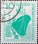 GERMANY, DDR - CIRCA 1958 : a postage stamp from Germany, GDR showing a general cargo cargo ship friendship type: peace on the pie