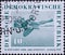 GERMANY, DDR - CIRCA 1959 : a postage stamp from Germany, GDR showing a man jumping over the bar in the high jump. German Gymnasti