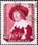 GERMANY, DDR - CIRCA 1959 : a postage stamp from Germany, GDR showing a painting: Young man in a black skirt by Frans Hals. Painti