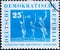 GERMANY, DDR - CIRCA 1959 : a postage stamp from Germany, GDR showing some women doing gymnastics with clubs. German Gymnastics an