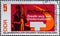 GERMANY, DDR - CIRCA 1967: a postage stamp from Germany, GDR showing a worker with a red flag. Text: 50th anniversary of the great