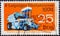 GERMANY, DDR - CIRCA 1974 : a postage stamp from Germany, GDR showing aa beet harvester `KS-6`. Leipzig Autumn Fair