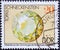 GERMANY, DDR - CIRCA 1974 : a postage stamp from Germany, GDR showing a topaz, snail stone Vogtland. Minerals from the collectio