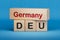 Germany and DEU symbol. Concept words Germany and DEU on wooden blocks.