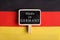 Germany Flag and blackboard with Text Made in Germany