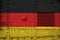 Germany flag depicted on side part of military armored tank closeup. Army forces conceptual background