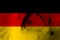 Germany, German, Deutschland flag with clock close to midnight in the background. Happy New Year concept