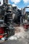 GERMANY HARZ. Driver filling water into historic steam engine