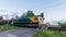 Germany , Krimnitz , 02.06.2020 , A train at the level crossing