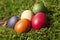 Germany, Lower Bavaria, Variety of Easter eggs on moss in the forest